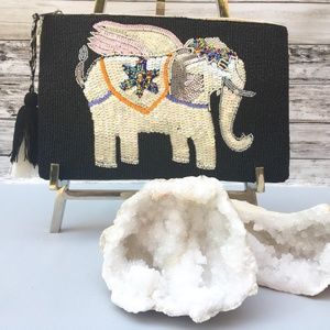 CLUTCH-EMBELLISHED ELEPHANT